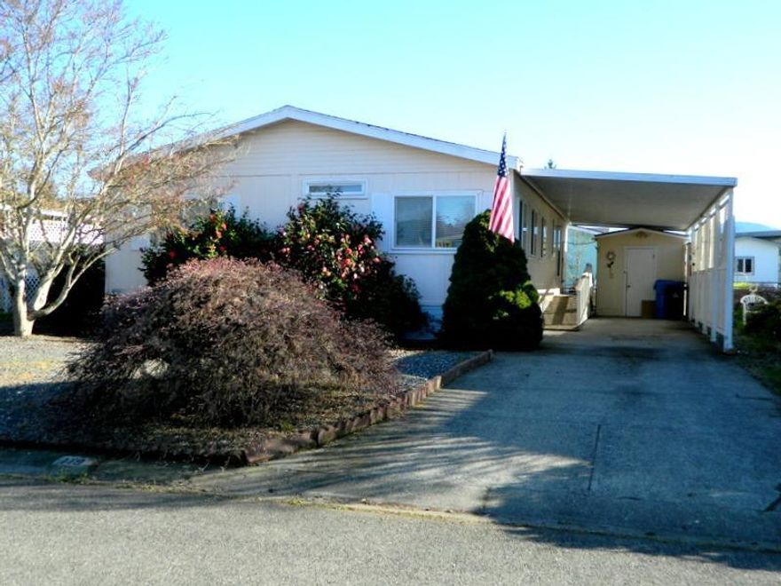 Delightful home in Willow Estates North. 1993 Golden West manufactured home with 1080 sqft. 2 bedroom, 2 bath home with split bedroom floor plan. Spacious living room, kitchen with Birch cabinets and breakfast bar. Master is spacious with walk in closet. Master bathroom has handicap shower, single vanity and linen cabinet. 2nd bedroom and hall bath. Laundry room off kitchen. Tandem 2 car carport , 8x10 storage shed. Fenced backyard. Partial automatic sprinkler system. one pet up to 15 lbs. 55+ Community.