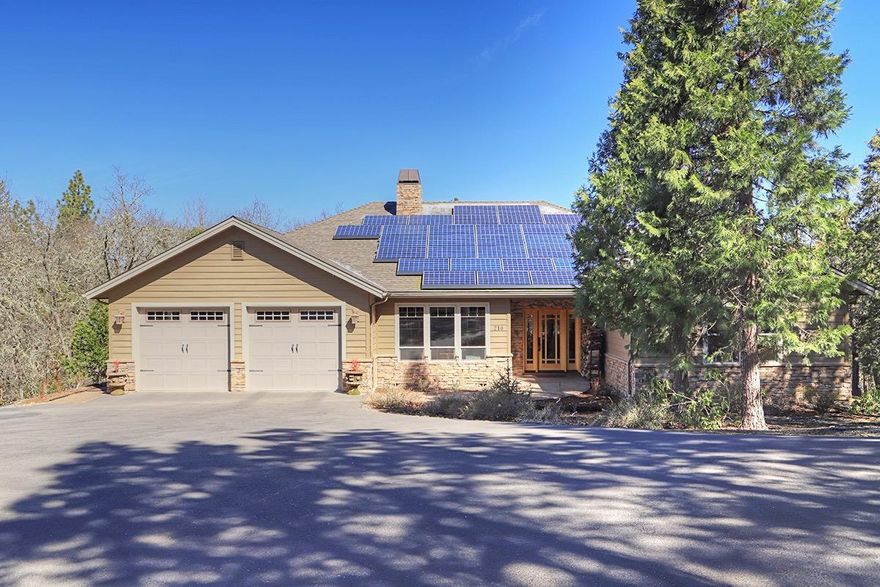 Beautiful Custom Home in Gorgeous Park-like Setting! Built in 2007, 5 Bedroom, 4 Bath, 3,800 Sq.Ft. (per seller). Home has Everything you'll Need! Open Floor plan that Features Beautiful Hardwood Floors and a Fabulous Kitchen with Stainless Appliances, Granite Countertops, Custom Cabinets, Island & Pantry. Large Windows and French Doors in Living & Dining Areas offer Amazing Views as well as access to the wrap around Decking where you can Extend your living space Outdoors. Generous Master Bedroom/Bath with Double Sinks, Bathtub with a View, Walk in Closet with Built-ins, as well as Door to Deck with Covered Hot Tub. Daylight Basement with own Entrance could be a Two Family Set up, used for Guests, Rental or Additional Living Space. This area Features a full Kitchen, Bedroom, Bathroom & Laundry. Detached Shop with 220 Power, Bathroom & Woodstove. Paved Area for RV Parking, Tesla Solar Panels on Home for Savings. Don't miss out on all This Spectacular Home and Property has to offer!