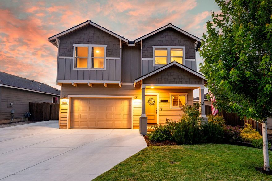 This nearly-new, two-story home offers the perfect mix of modern style and convenience. Mirage is located in the heart of Redmond with easy access to the Dry Canyon.

The home itself offers modern finishes and a functional design. Downstairs you will find the kitchen, dining, and living rooms with a gas fireplace. The kitchen features quartz countertops, a large pantry, and stainless steel appliances. Upstairs, 3 bedrooms, 2 full bathrooms and a loft that can be used as a secondary gathering space.

The homesite has one of the largest lots in the neighborhood, with a sprawling lawn, covered patio and built-in gas firepit. The driveway offers extra parking and a gate to the side yard for additional vehicles or toys.