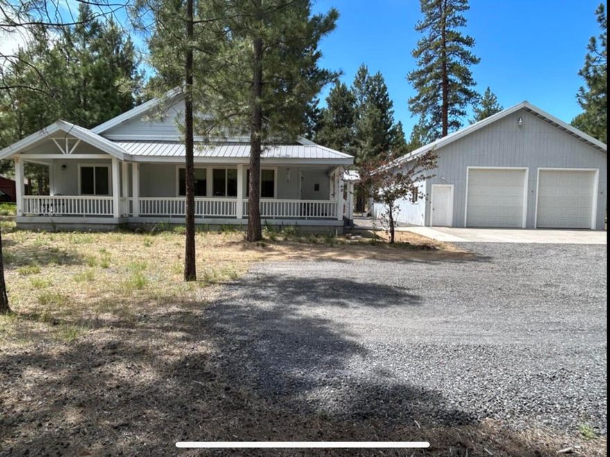 Nestled in the heart of Ponderosa Pines you'll find this triple wide manufactured home. Featuring high ceilings, 2 living rooms, 3 bedrooms and 2 full bathrooms. The front and back decks are a peaceful place to enjoy your morning coffee. Close to lakes and hiking. A great location to explore the great outdoors of Central Oregon.