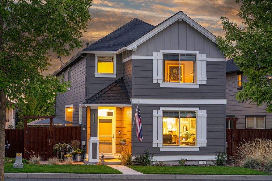 Experience this exceptional park-front property on a tranquil one-way street. This immaculate turnkey home highlights over $35,000 in luxurious builder upgrades, creating a peaceful craftsman cottage style retreat with its large, wood-wrapped windows displaying views of the community park and Barnes Butte. The redesigned main level features a spacious kitchen with a quartz eating bar, updated kitchen appliances, and stylish pendant lights that open to the dining area and great room, complete with a cozy gas masonry fireplace. Upstairs, a generous loft living space leads to the guest rooms, a full bath, and a laundry room, nicely separated from the impressive, large master suite, which offers stunning views and a luxurious bath suite with an upgraded tiled shower and a walk-in closet. Ochoco Pointe community offers resort-style amenities of front yard landscaping maintenance, a seasonal pool, children's play area, ½ sports court, and paved trail along the protected wetland reserve.