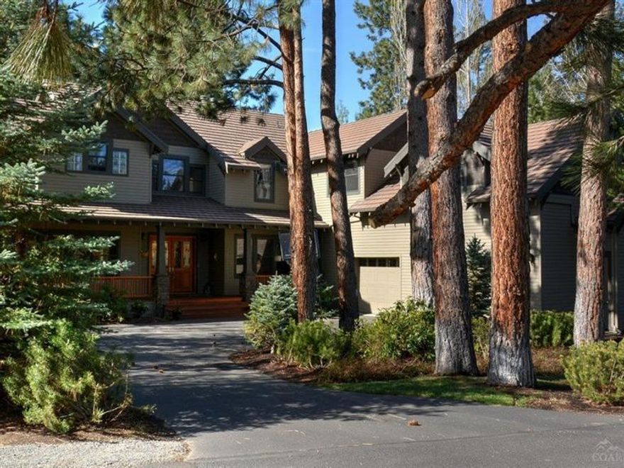 Elegant Craftsman situated on .45/AC private lot in Broken Top. Extensive remodel in 2013. State-of-the-art gourmet kitchen features Caesarstone counters, Maple cabinetry, Prof. 48in 6 burner Bertazzoni Range/Oven & Gaggenau steam/convection oven. Panoramic doors & window system creates stunning indoor/outdoor living. Hardwood floors throughout, spacious master suite + 4 add'l bedrms w/ Jack&Jill baths. Den, massive bonus/media rm, 3-car garage. Unfinished basement with 10 ft ceilings not included in SF.