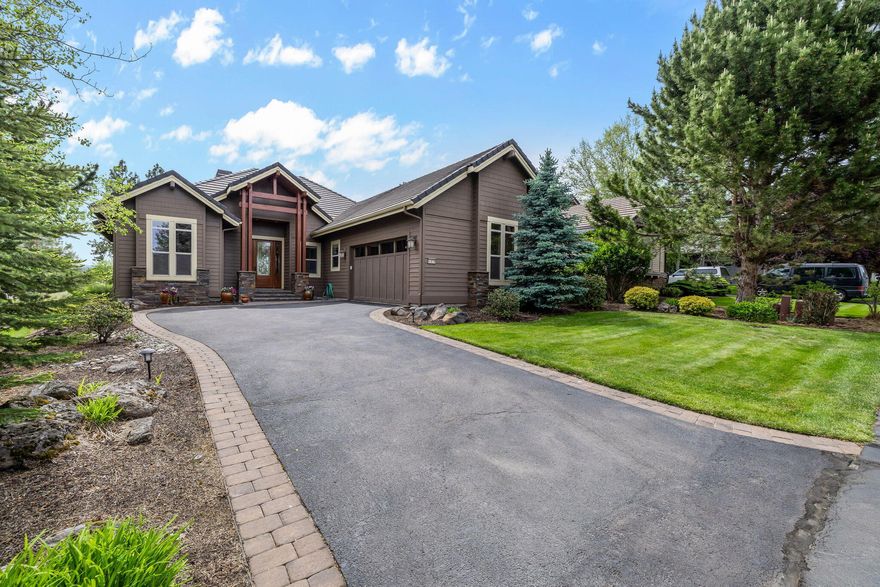 Welcome to this lovely single level Broken Top home, offering 3 bedrooms an office and Cascade Mountain Views showcased thru gracious interiors and an expansive patio equipped with remote controlled blinds for those glorious sunny Central Oregon days.  As you step inside, gleaming hardwood floors lead to inviting great room w/ elegant tray ceilings, alder cabinetry & stone encased fireplace. Wall to wall windows offer views of serene backyard, open space, forest & mountain views. Dining area connects to chef's kitchen w/ breakast bar, SS appliances, solid surface counters & pantry.  Tranquil primary suite inc remote-controlled blackout blinds, private patio access & spa-like bath featuring heated floors, soaking tub, tile shower, dual sinks & walk-in closet. Set in separate wing, two guest rooms & bath w/ heated tile flooring provide a private retreat for guests. The large office offers an ideal space for working or studying at home. 2-water heaters. HOA provides landscape maintenance