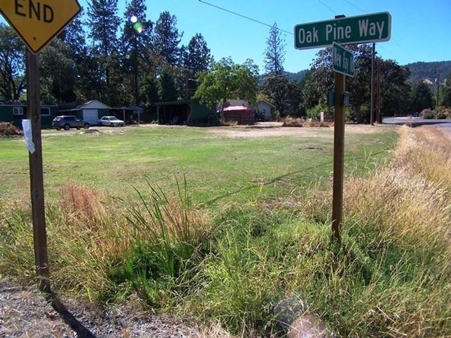 A rare find indeed. .30 =/- acre corner lot in Grant Acres Subdivision. This is that special subdivision located in the northwest corner of Grant Road and Beall Lane. Good well per seller and Rogue Valley Sewer main in the street. Corner location may allow for two access points. Existing frame shed on property. With proper placement, a two story structure would have the potential for a Table Rock view from the second level.