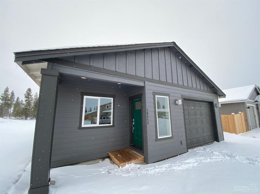 Arbor Builders is proud to present this semi custom and upgraded 'Madrone' model. With a cute, craftsman exterior and well thought out floor plan, this one is a must see! The home is well appointed with designer chosen finishes including custom cabinets, flooring, plumbing fixtures, appliances and tile shower in the guest bath. This home also includes central air conditioning for those beautiful, warm La Pine summer days. Outside, you will find a landscaped front yard with sprinklers and a huge lot that backs to BLM land to the south where you can access trails. This home is move in ready and calling for you! Taxes are from 2019 for the lot only. Call today because this home is priced to sell very quickly!