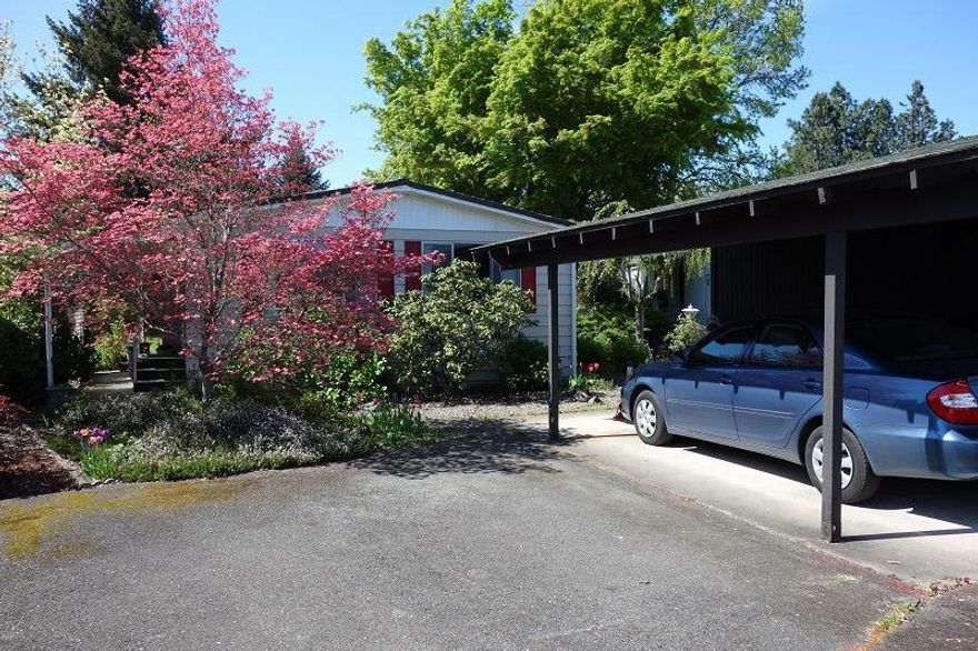 Nice 1975 2 bedroom 2 bath manufactured home in 55+ park. This 1440 sq. ft. home has insulated floors and new furnace. A sun tunnel was installed in the kitchen for extra daylight. Guest bedroom has a deck leading to the back yard. Room for a small garden. Storage area. Easy parking into and out of the carport.