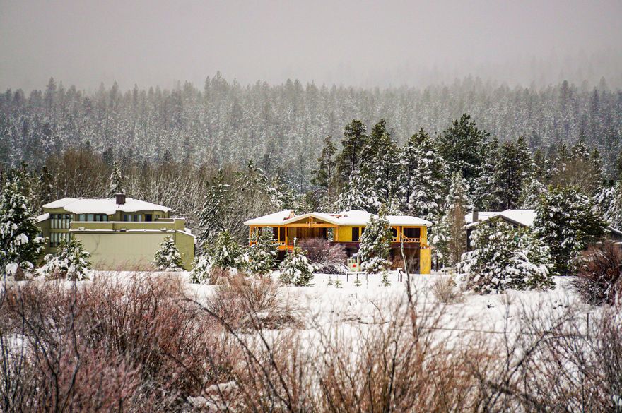 Attention Pilots – fly in to your new HANGAR home located in the premier resort destination community of the Pacific Northwest! Rare opportunity to own property in Sunriver exclusive Sky Park which is surrounded by the Deschutes River. Home plans for open concept layout with contemporary design included. Enjoy meadow views from your grand living room with multi slide doors that open to an expansive covered deck. Entertain guests in luxury with large custom gourmet kitchen. Spacious main level primary suite with private balcony deck, two additional nicely sized private guest suites, main level office den and nicely sized lower-level bonus room for flexible use. Not a pilot? Imagine the possibilities of the ultimate Man Cave, Car Storage, Workshop, in the 3,000 plus square foot (50' wide x 35' deep x 11.5' tall) hangar space and Triple car garage with dual car lifts (up to 5 cars total) to complete this exceptional executive style home.