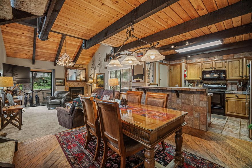 Location, comfort, and versatility all wrapped into one! This updated 2 bed / 2 bath condo is ideally situated near the Sunriver Lodge, Sage Springs and The Village - the perfect location for year-round enjoyment. Featuring two spacious primary suites. Three outdoor living areas downstairs plus a private balcony, this home is designed for easy living and entertaining. Kitchen and bath counters have been updated with tile. Executive units have a sauna located in the upstairs bath.  Upstairs there is a murphy bed and on site washer/dryer. Unit #49 is located at the top and back of the Tennis Village properties, past Sage Springs Spa.  Whether you're looking for a weekend retreat, full-time residence, or investment opportunity, this one checks all the boxes! Offered fully furnished.