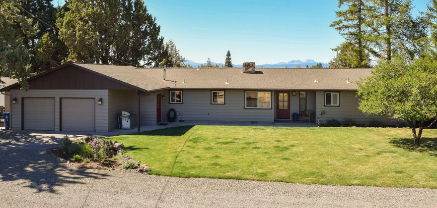 Custom single level home w/unobstructed cascade views on 7.8 acres w/5.5acres of automated underground Arnold Irrigation. Upon entering the home, you are greeted w/jaw dropping views from the great-room windows, expansive granite counters, breakfast bar, stainless appliances, breakfast nook, dining area, a wet bar w/wine rack, & a wood burning fireplace w/hearth. The primary is separated from the 2 guest beds & office via the great room & has an amazing view, private slider access, a new primary bath w/double headed tiled shower, two separate vanities, enclosed toilet, & a walk in closet w/a built-in gun safe & laundry door to the utility. All guest bedrooms & the office are generous in their size & the guest bath has new tile floors, a tiled tub/shower & double vanity. The expansive back paver patio has a great seating area & spa. The detached workshop is insulated & next to the house & the barn is a great place for feed, storage, & animals. There's even a greenhouse & chicken coop!