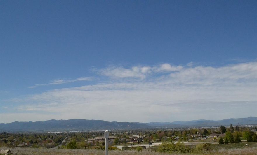 Don't miss this attractively priced, shovel ready lot for sale in Medford's premier subdivision: Bella Vista Heights. Unlike most developments in East Medford, there is NO minimum building square footage requirement, all building designs to be approved by the Architectural Review Committee. Seller is offering courtesy to builders; multiple lot purchase discounts available. Call for details. Lot 45.