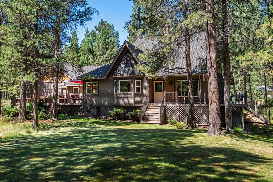 Located just 4 miles from Sunriver at the headwaters of Spring River this spectacular home sits on .86 acres and offers plenty of space both indoors and out. The main living space features 18-foot vaulted ceilings and an open floor plan with tons of windows bringing the outside in. The spacious floorplan spreads out over 3,424 SF and includes two separate living areas. There are 4 bedrooms including an in-law suite which is separated from the main house by the welcoming breezeway. The kitchen and dining area open to sunroom and the huge back deck. The living room, has a wood burning fireplace, built in bookshelves and access to the side and back deck area. Outside is truly special, with two large deck areas, a hot tub and a gazebo. There is no shortage of space for entertaining or relaxing. If outdoor recreation is your passion, look no further. Miles of mountain bike trails beckon and kayaking/paddle board adventures await right outside your front door. A must see property