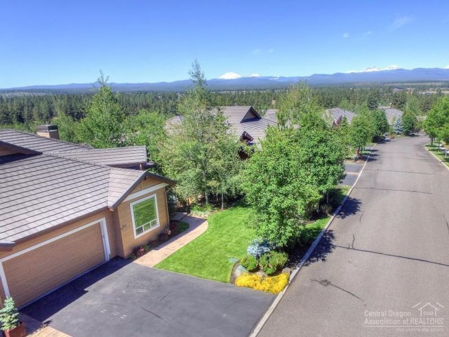 Soak up the expansive city, terrain, and Cascade mountain views from the deck of this beautiful Arrowwood Summit Townhome. This home has been meticulously cared for and affords easy main-level living with two additional bedrooms, baths, and a bonus room downstairs. The convenient central westside location is the perfect launching pad for all your Central Oregon adventures.