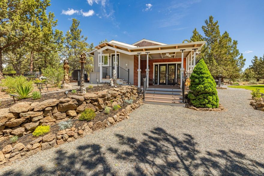 Discover a peaceful retreat on over 2 acres, just minutes from all the amenities Bend has to offer. This charming 2100 + sq ft split-level home blends comfort and functionality seamlessly. The home features a spacious upper-level primary bedroom, while the main level hosts 2 guest bedrooms. Cozy up by the wood-burning stove in the living room or unwind on one of the 3 decks, surrounded by a beautifully landscaped backyard and natural acreage. A nearly 600 sq ft single-level guest house offers versatile space for an artist's studio, home office or a 1-bedroom apartment. Enjoy serene surroundings from the deck and the convenience of a gravel driveway, ideal for guests or creative pursuits. Addtl features include a 2-car garage, a separate shop/garage and a full RV hookup. Located on a quiet cul-de-sac, the property boasts old-growth trees and lava rock formations, offering a unique blend of natural beauty and practical living spaces. Perfect for those seeking a tranquil retreat.