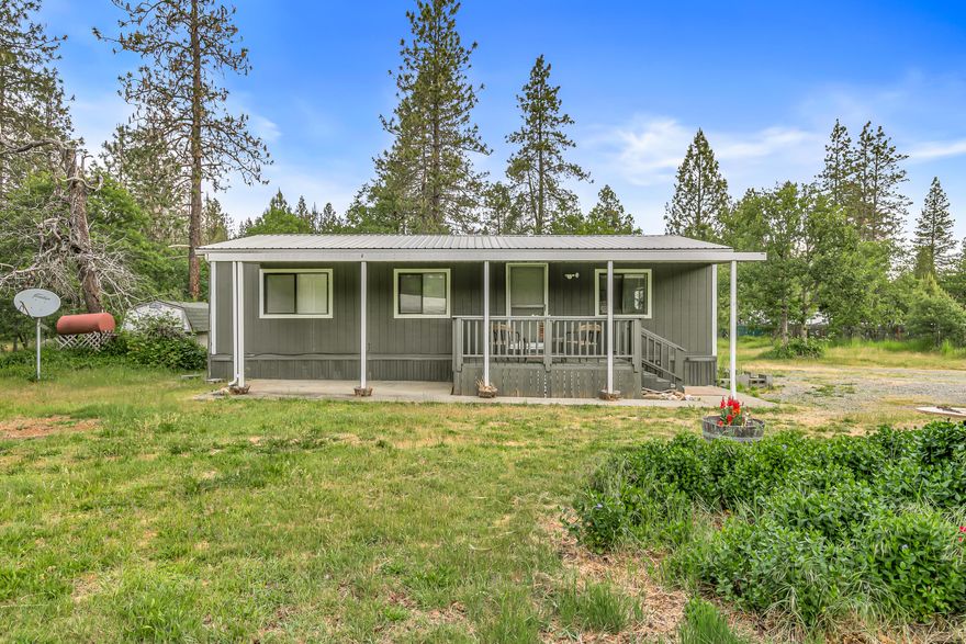 Set on a full acre of beautiful land with breathtaking mountain views, this 2-bedroom, 2-bathroom, 1,080 sq ft double-wide manufactured home is a dream come true for anyone seeking peace, privacy, and the beauty of nature.

Step inside and enjoy a spacious, comfortable layout that's perfect for full-time living or a relaxing weekend escape. Large windows bring the outdoors in, filling the home with natural light and showcasing the surrounding scenery.

Outside, you'll have all the room you need to garden, explore, or simply unwind under the open sky. The property offers endless potential and plenty of space to make it your own.

If you love nature, this is the place for you. Quiet, scenic, and surrounded by the best of Oregon's countryside — this is country living at its finest.