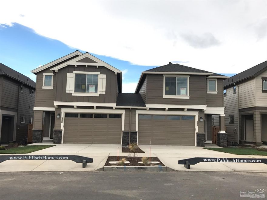 Tour of Homes Award Winning Samson Plan (Best of Show, Best Master, Best Kitchen, Best Interior Finish, and more) Brand new townhome w/the quality Pahlisch Homes is known for-stainless steel appliances, laminate wood flooring, Chroma quartz counters w/under-mount sinks, and lots of natural light. Only attached at garage, powder bath & kitchen-bedroom walls are NOT attached.Model home is at 63158 Meridian, open Thurs-Sun 11-3 & by appt. SAMSON TH-2-F-1815-2