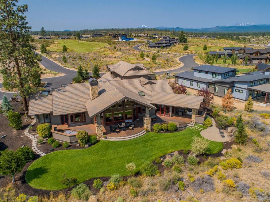 From the moment you enter this single owner, Pacwest custom built 3 Suite home, you will be struck by a vaulted entry, beam work & gorgeous use of natural stone. Livable open floor plan design w/ Master, 2nd Suite, Office & Formal Dining on the Main. Upstairs: 3rd Suite, generous Game Rm & wrap around pavered deck to soak up the Cascade views. Enjoy a large rear patio w/ golf views & pvt hot tub. An inspiring, must see home on one of Tetherow's most quiet streets in a cul-de-sac. Golf Membership included.