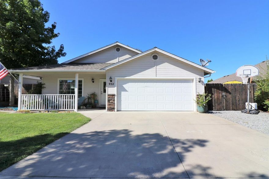 Beautiful Southwest Medford Home Located in the Very Desirable Hampton Place! Excellent Condition and Great Neighborhood. This 1615 sq. ft., 3 bedroom, 2 bath has vaulted ceilings in the living room which offers a spacious feel as you enter the home. There are real hardwood floors in the entry, kitchen and dining room, custom Birch kitchen cabinetry, and newer interior paint and carpet within the past 6 months. In addition to the main living room, there is also an additional, separate family room & breakfast nook. The master suite comes complete with a walk-in closet, double sinks and walk-in shower. A glass slider leads out to the beautiful back yard which is completely fenced with mature trees, a wonderful covered back patio perfect for gatherings and entertaining, gated RV parking and more. Both the front and back yards are beautifully landscaped with timed sprinklers as well. There is an attached 2-car garage. This property is move-in ready, so bring your Buyers today!