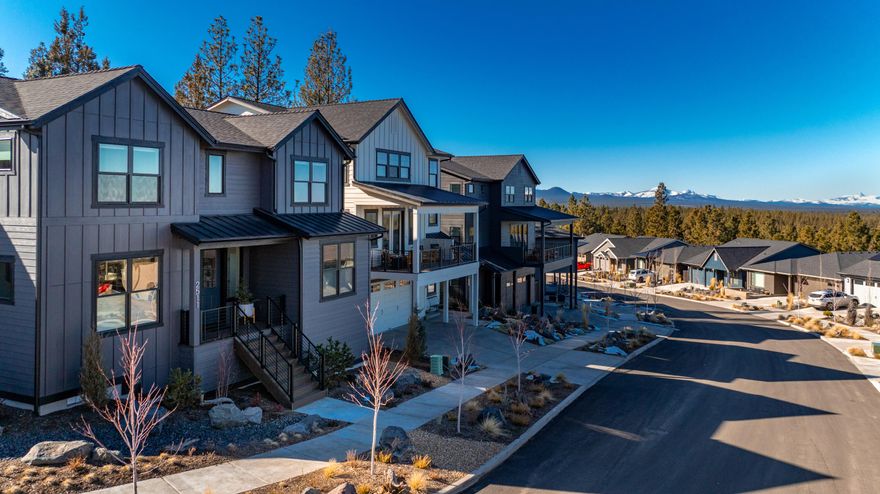 This better than new house has been lovingly upgraded and truly shines. Sitting atop the westside's Marken Summit, the multiple mountain and Smith Rock views to the north are absolutely gorgeous. Quail park sits just below this neighborhood, with pickleball, basketball, play structure and forested area with children's bike paths. Recent upgrades include brand new pantry build out, California Closet package in all closets, new designer lighting and fixtures, refrigerator, washer and dryer. This 4 bedroom home, including an amazing bonus room that could be used as 5th bedroom, is a smart and functional floor plan. The living room spills out onto a private backyard oasis of native landscaping, wild flowers, with room to play. Enjoy all the amenities of neighboring communities like NWX and Discovery West at a fraction of the price.