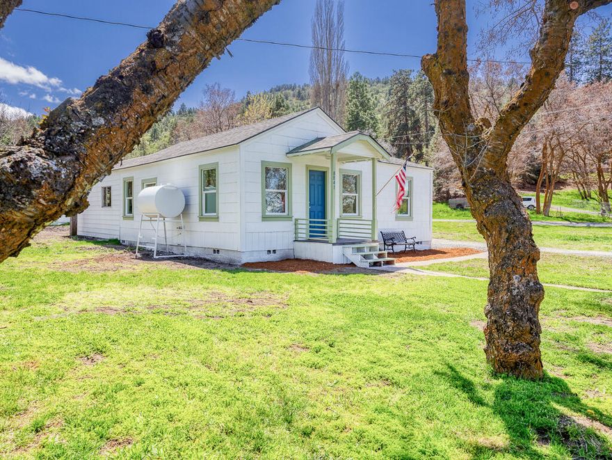 *Sellers are offering a $5,000 credit for rate buy-down/closing costs.* Welcome to 8841 Shady Pine Rd, nestled on 0.4 acres in the quiet countryside just outside of Klamath Falls. Only minutes away from downtown, restaurants, OIT, and more the location is so convenient. This thoughtfully renovated 1920s home offers many upgrades including the bathroom, kitchen, windows, LVP flooring, electrical and plumbing systems, and new interior and exterior paint. The beautiful kitchen boasts butcher block counters, a farmhouse sink, updated cabinets, subway tile backsplash, and stainless-steel appliances. The large, detached shop is truly a highlight. It has 5 separate rooms and power to the whole thing. One garage with workbenches, 2 storage rooms, a cellar storage room, and one large room with concrete floor, and wood heat. Surrounded by nature this area offers abundant wildlife and easy access to hiking, fishing, hunting, and more. Come see this turn-key home today