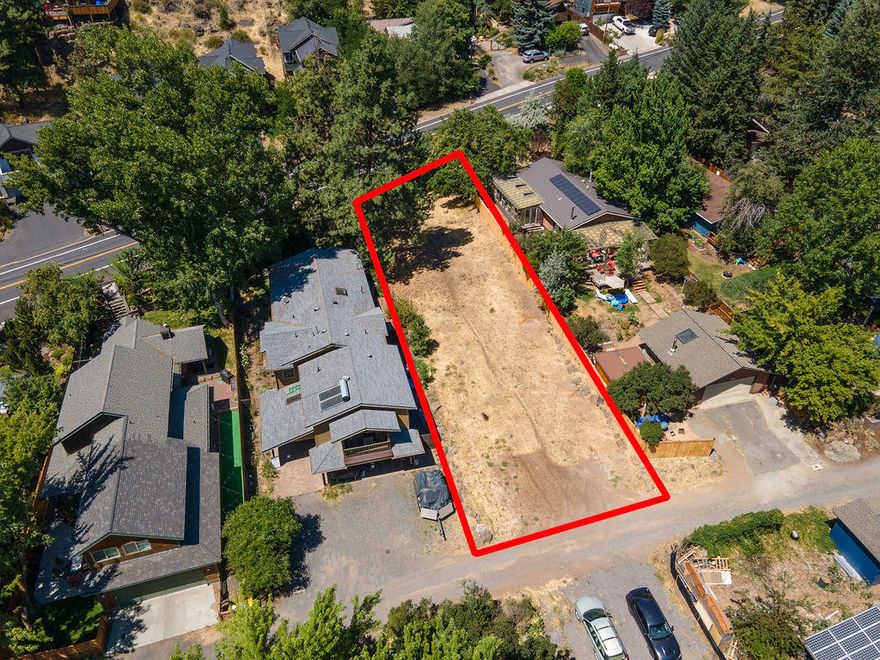 Located within minutes to the Deschutes River and walking distance to shops and dining downtown, this NW Bend, 0.19 acre lot is the ideal location to build your dream home in the heart of Bend.  Its prime location allows you to walk out your door and head any direction to enjoy everything that Bend is known for; outdoor activities, breweries, Drake Park and its quaint downtown.  The generous size of this lot opens up many possibilities to create your personalized home to suite your lifestyle. It's hard to find bare, level land in NW Bend, this is a true gem.