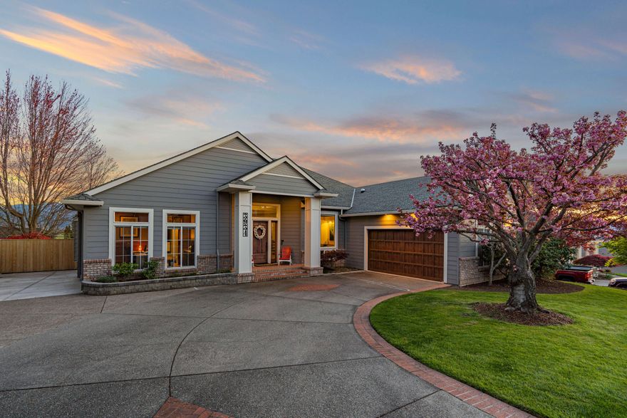 Discover unparalleled luxury at 3934 Piedmont Ter, East Medford's prestigious Cherry Lane Estates. This exquisite home boasts original oak hardwood floors, soaring 12' ceilings, and panoramic valley views. The main floor features a formal dining room with custom built-ins, a chef's dream kitchen with a Sub Zero fridge and JenAir gas range, and dual living spaces with cozy gas fireplaces. The expansive primary suite offers triple walk-in closets, a steam shower, and heated floors. Downstairs, indulge in the media room, billiard room, guest suite, 2-person Jacuzzi sauna, nearly 600-bottle temperature-controlled wine cellar, and a versatile gym area. Outside, a composite deck, solar-heated pool, hot tub, and artificial turf await endless entertainment, all framed by a breathtaking valley backdrop. Experience sophistication and tranquility in this remarkable Medford gem.