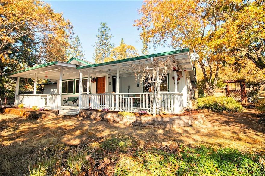 Perfect starter home on 1.16 usable acres tucked back in the heart of Colonial Valley. This charming 3 bed 2 bath home has an inviting open floor plan, Large Master with his and her closets and large shower water closet and double sinks. 2nd bedroom has extra office room and closet. Attached two car carport leading into the mud/laundry room and extra storage bonus room. Enjoy quiet sunsets and entertaining on the large covered porch. Roof is less than 5 years old. Extra storage garden shed and 6 cord firewood shed. Pet fencing for your animals and low maintenance inground sprinkler system. This home has so many possibilities. Come take a look today.