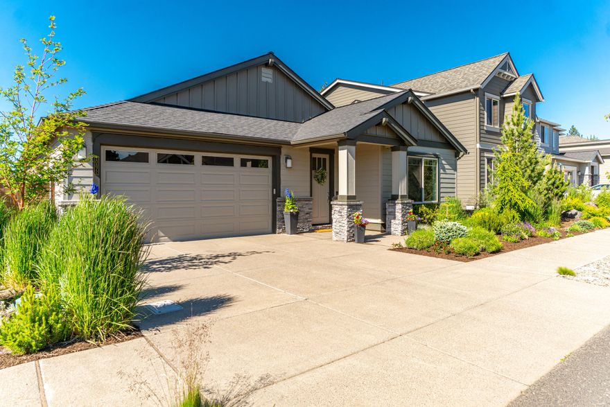 One of a kind upgrades grace this single level Pahlisch built home in the sought after community of The Bridges, featuring exceptional neighborhood amenities including walking trails, pool, fitness center & clubhouse. With the just completed 37 acre Alpenglow Park just a couple of blocks away and an open space buffer at the back of the property, this home enjoys an enhanced feeling of peace & privacy. A large covered patio and easy maintenance landscaping in the fully fenced yard provide the perfect backdrop to relaxing evenings or lively gatherings. All the essentials are here, from plentiful windows illuminating the expansive great room, to the roomy kitchen with center island, to a spacious primary suite. Two additional bedrooms share a Jack & Jill bath. But, it is the extra details that truly set this home apart: coffered ceilings & 8' doors, wood-wrapped mirrors, upgraded finishes, attic storage & an oversized garage with room for shop or exercise area. Don't wait on this one!