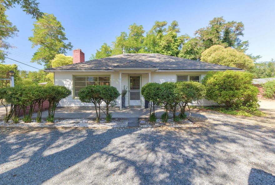 First time buyers! Investors! Income property! Zoned R-2 and room for a duplex and more. This .51 city lot sits off the street with plenty of yard and shade trees to offer a buffer and privacy. This property has plenty of room for a shop, RV parking, and all your family gatherings. Come inside to this light and bright remodeled two bedroom one bath home with open floor plan, large cooks kitchen, spacious bedrooms, and wood burning fireplace. To much delight, there is a bonus newly remodeled studio with its own bathroom and entrance. Possibilities are endless for income, development, and lifestyle on this property. Make an appointment today!