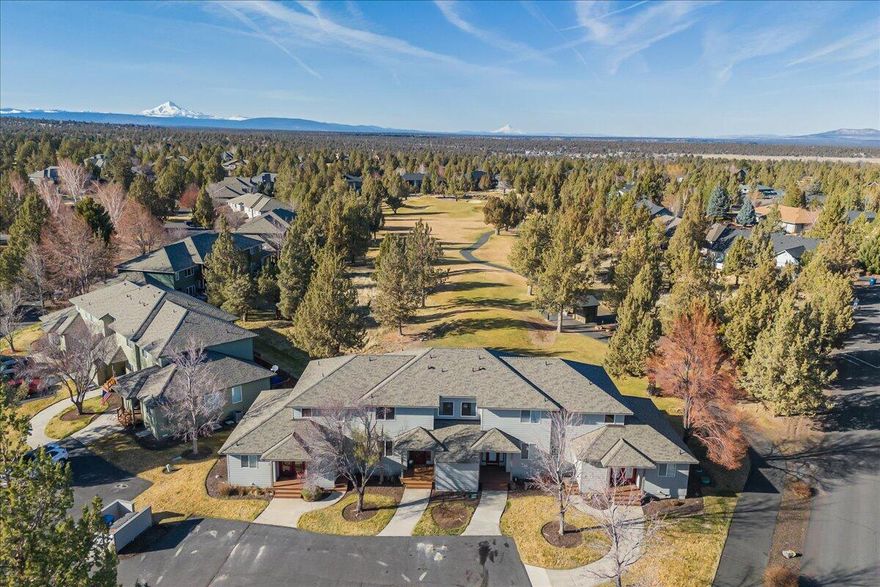 Attention golf enthusiasts,  check out this exceptionally located townhome in Eagle Crest Resort! This well  appointed 2-bed, 2.5-bath townhome offers stunning views of the first fairway on the Ridge Course, host of the 2023 Open. Enjoy the serene golf course setting from your private patio or unwind in the brand new hot tub after a day of adventure. The primary suite features its own balcony, perfect for morning coffee with breathtaking views. Just a short walk to the Ridge Sports Center and Pro Shop, this home provides easy access to resort amenities, including pools, fitness centers, pickleball courts, and miles of scenic trails. The open-concept living space boasts a cozy fireplace, vaulted ceilings, and abundant natural light. Whether you seek a full-time residence, vacation home, or investment opportunity, this townhome delivers the best of resort living in Central Oregon. Don't miss this rare opportunity!