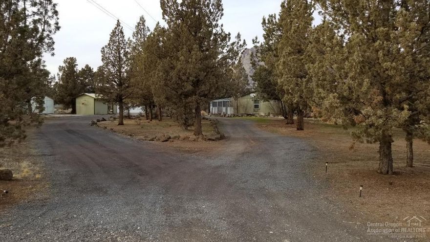 Nicely designed home on 2.73 acres with spectacular views of Smith Rock! Large detached studio or shop or can be used for many purposes. Detached double garage and storage building. Lots of mature trees. Plenty of room for horseback riding and for all your toys and pets! Enjoy the peace and quiet and watch the sun go down in one of most lovely spots in Central Oregon!
