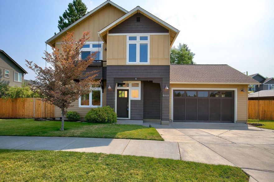 You will fall in love with this spacious, light and bright move-in ready two-story home. The open concept main level features beautiful Bamboo wood floors, wood beam accents, cozy corner fireplace, ample kitchen cabinet storage, breakfast bar and a built-in writing desk. Main living space opens up to a charming patio in the private, fully fenced back yard, perfect for unwinding and entertaining. Head upstairs to your dream master bedroom with Juliet balcony and indulge in the amenities of your en-suite bath with open walk-in closet, soaking tub, glass block walk-in shower and double vanity. Two generous sized guest rooms with a shared bathroom complete the second level. Large side lawn area for your pups to run. Two car attached garage. Great location and walking distance to the future 37-acre Alpenglow Park. This property will go quick!