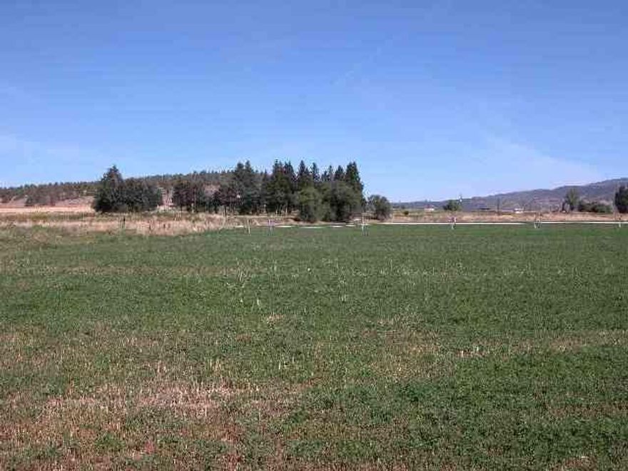 Inside Ugb Zoned R5 Can Be Divided. Currently In Alfalfa With Ag Deferral. Has City Wataer & Sewer To Edge Of Property. Excellent Building Site-could Be Gentlemens Farm Or Horse Property.