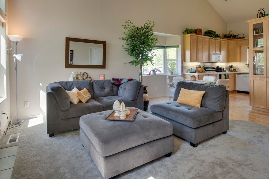 Easy living in this updated spacious townhome. Located on the end for lots of light, privacy and great views outside your windows. Updated with fresh coat of paint, brand new carpet and refinished maple floors.  Large master bedroom on the main floor with two large bedrooms and loft area upstairs.  What a great spot to enjoy all Redmond has to offer:  close to recreation, great views and rich community life.