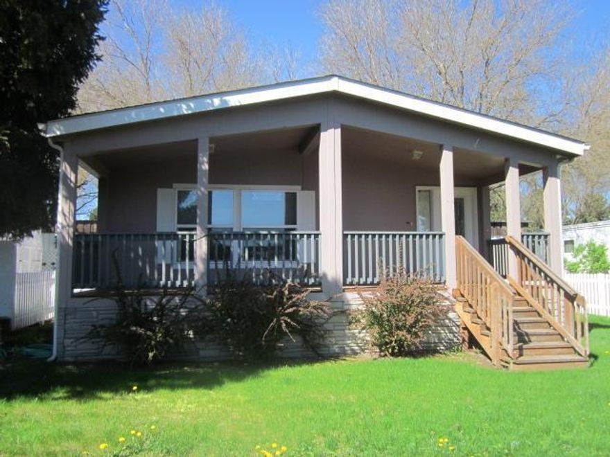 55 plus park just over the hill from Jacksonville. This double wide has over 1500. Square feet. Full covered deck for sitting or entertaining, Includes Refrig/Dishwasher/Stove-Oven/ Microwave. Very nice park with Mature trees and nice views. Space rent is only $ 360/mo. includes Water,Trash,Sewer. Has full sized carport with locking storage shed attached. Lots of room and well kept. RV Parking spaces available in the park.