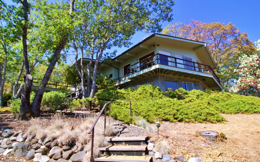 Check out the views in a super desirable location overlooking the rolling hills of Ashland! This beautiful estate was established in 1966  with 3 bed 2 full baths and 2524 total Sq ft!! The home is the last one on the road into a dead end so its private slice of paradise. The architecture of the home is unique as seen on the front photos. This house is move in ready and is a prestigious location in Southern Oregon. Ashland is home to Shakespeare, Independent Film Festival, and the world famous Lithia Park, Ashland's crown jewel with walking paths, duck ponds, Japanese Garden, Park Benches, Parking, Pickleball Courts, Picnic Areas, Playground, Restrooms,Volleyball and all kinds of activities during the summer! There is a work shop in the home and a office that overlooks the rolling hills around Ashland! Check out the walk thru video and Come take a tour TODAY!