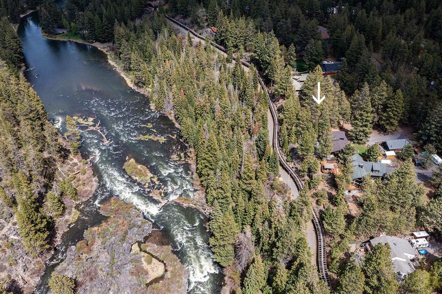 Create your ultimate haven on this prime .43 +/- acre lot bordering the Deschutes River and National Forest Land! Nestled in the trees with sounds of the river nearby, and surrounded by stunning residences, opportunities like this are rare. The level building site on a paved road offers many possibilities. You'll benefit from the Avion water access available at the street and the Arnold Irrigation flume at the rear of the property. Close to the conveniences of downtown Bend and tons of recreation. This is a must-see property!