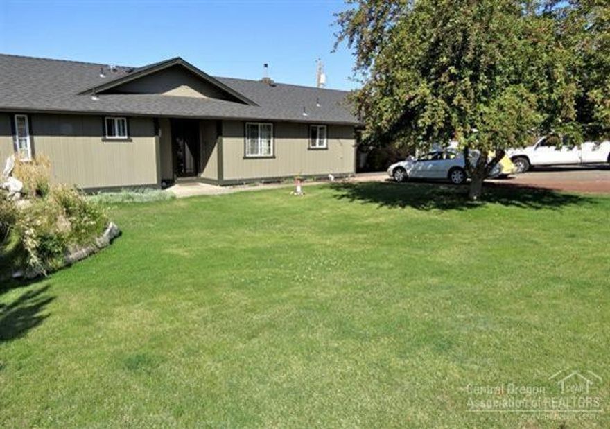 Must see this private oasis - 1 full acre with Cascade views(INCLUDES buildable sep tax lot!) Home has been completely updated with new roof, paint & vinyl windows. Interior features all wood floors & tile with superb master suite & tile deco walk-in shower. Upgrades include knotty alder solid wood doors & trim, stainless appliances & pellet stove. Enjoy mountain views from your private patio & yard. 2 car garage, plus large shop. All this just minutes to town!