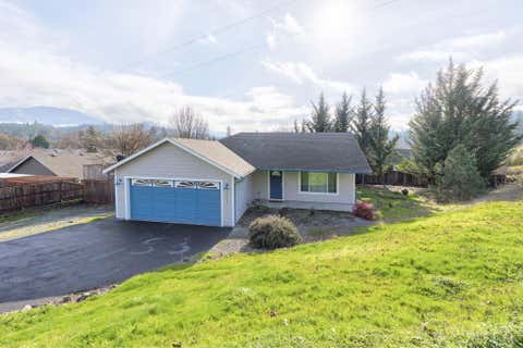 Photo of 1884 SW Allen Creek Road, Grants Pass, OR 97527 (MLS # 220226809)
