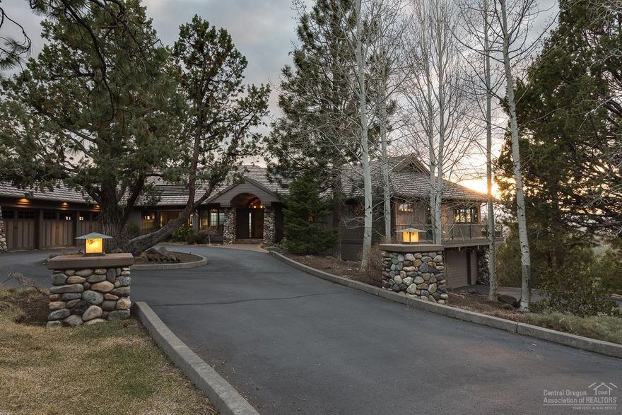 Private luxurious Mountain Estate with Cascade Mountain views from every room. Home is sitting almost to the top of Awbrey Butte on 1.92 acres. All 4 bedrooms are suites. Guest or in law quarters downstairs with private entry and 2.5 car garage. Home features floor to ceiling fireplace and over sized paver stone deck & patio.