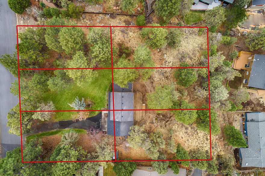 An unbelievable development opportunity in Bend's desirable lower West Hills neighborhood! The 3/4 acre tax lot contains 6 legal lots of record, adjoining an unimproved 40' wide portion of Wilmington Ave. This rare estate home site is close to Hillside Park, downtown & is situated on a quiet, low traffic street providing multiple possibilities. Existing home is beautifully maintained & set back from 6th St amidst towering old growth pines. This 1976 home features 4 bedrooms, 2 full and 2 half baths & abundant natural light, views and privacy. A charming living room is anchored by the wood burning fireplace & features a dining area with direct access to the full-length eastern deck, perfect for entertaining with privacy & amazing eastern & Pilot Butte views. Recent updates include new interior paint, new flooring and lighting upgrades.  Create your private, spacious Westside Estate here, or develop additional home sites in one Bend's most coveted neighborhoods & locations.
