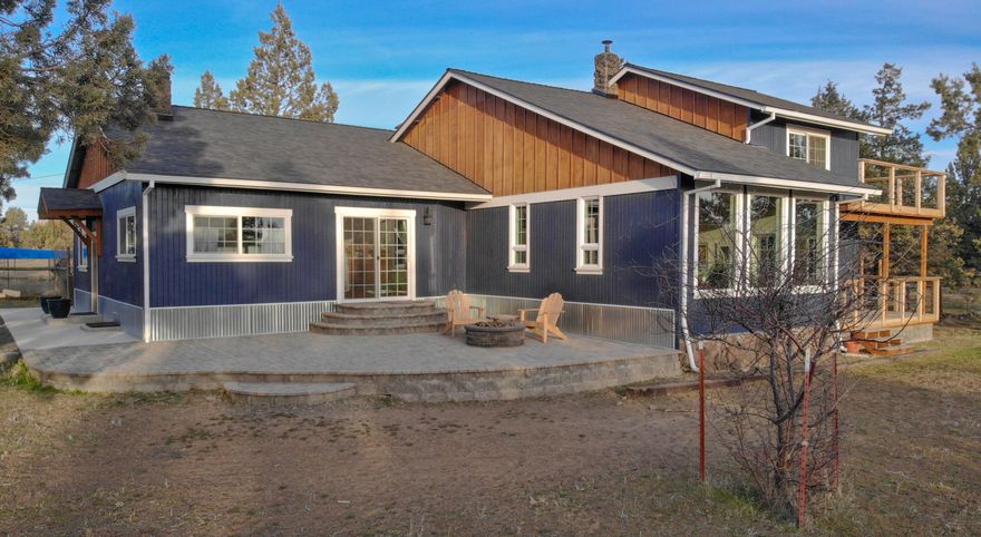 Here is the small acreage (4.28 acres) country home you've been waiting for!  Horse setup with 2 stall barn (room for 3), 2-acre dry pasture with full fencing, and 30 x 48 ft. insulated shop/garage w/loft.  The remodeled home has a Great Room design w/magnificent views of the Cascade mountains.  Acacia hardwood floors,  amazing island country kitchen that is truly the heart of the home (you'll love it).  Home has central A/C, wood accented, and vaulted ceilings, huge bonus/family room, primary suite w/private balcony looking at the Cascade mountains, expansive entertainment deck off kitchen and a beautiful paver patio off Great Room.  Tack house w/bunk, fenced garden, 2 wells, wood shed, heated dog kennel, RV parking with RV dump and so much more!  Don't miss out on this small acreage Paradise where lots of quiet, clear sky's, sunsets and starry nights await you!