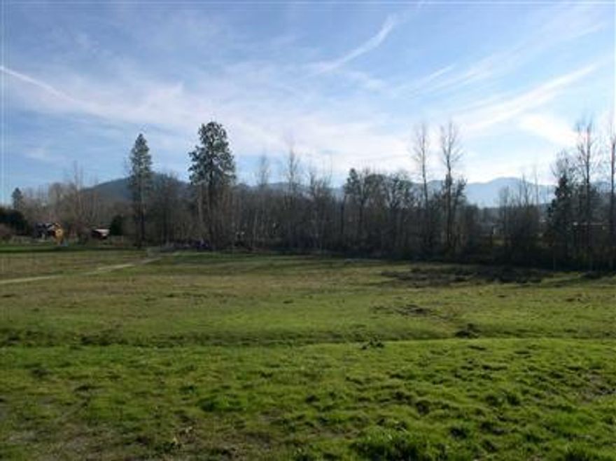 All info subject to change. Beautiful building site with irrigation from GPID. Elevated site, rolling terrain, open pasture, views of surrounding mountains. Old barn on property. Set back off the paved extension of Demaray - single lane. Great location. No mobile homes, 1000 sq ft minimum. Shared well (30gpm per seller) with neighbor to east, sand filter septic approval. Great piece of property.
