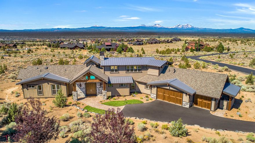 Newly completed home w/ 30 ft heated pool & inspiring Mtn views in the desirable community of Brasada Ranch. This home was thoughtfully designed, 18 ft vaulted ceilings, gourmet kitchen w/ Wolf, Bosch, & Thermador appliances, natural knotty alder cabinets, granite & quartz counters w/ marble backsplash, hardwoods, & a large island excellent for entertaining! Exquisite master suite w/ private deck, gas fireplace, & complemented by a beautiful bath w/ marble counters & tile, heated flooring, jacuzzi tub, & programmable shower. Excellent separation w/  2 additional bedrooms & bathrooms, a comfortable media room/4th bdrm w/ a motorized movie screen & Dolby Atmos speakers.  Oversized 3-car garage. An expansive patio w/gas fire pit, an additional fenced yard excellent for pets/ family fun, backing common space to take in the ambiance of the Cascade Mountain Range. Minutes to the Athletic Center, Pools, Spa, 18-Hole Golf Course, World Class Equestrian Center, Restaurants, Hiking, & Trails!