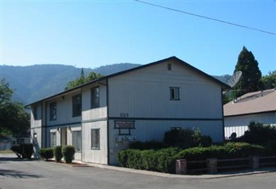 Need to see this well maintained four-plex located in the city of Rogue River. Very nice 2 bedroom, 1 bath units with laundry area in each unit. All units are in excellent condition. Some new carpeting, new exterior paint. Downstairs units have fenced backyard with patio.