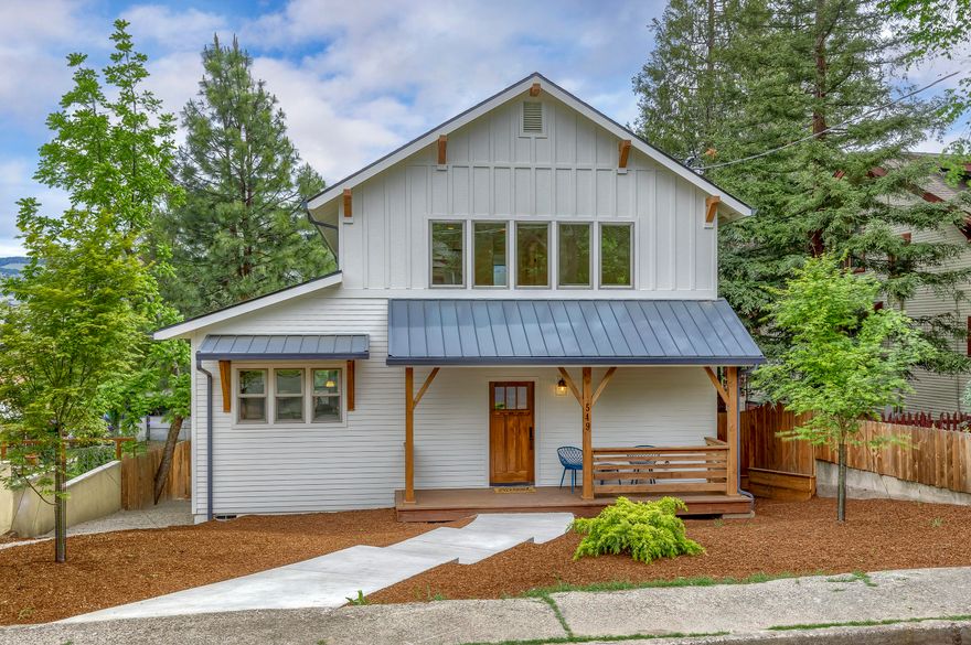 New construction on one of Ashland's most coveted streets. With alley access and a legal ADU, opportunities like this don't come around often. The main house is ''farmhouse modern'' and has 2253 sf. The light filled home has an open floor plan with birch hardwood flooring. The kitchen has vertical grain fir custom cabinets and a Wolf range, making this a perfect chef's kitchen. The main floor master bedroom is spacious and has a large en suite bath. Upstairs has a large landing that is perfect for movies/play/reading. It has wonderful views of the Siskiyou mountains as well. Two bedrooms and a full bath round out the spacious upstairs. Indoor/outdoor living is a breeze with the large cedar deck that sits off the great room-ready for entertaining. A 500 sf ADU (built in 2017) sits above the two car garage and is private. The vaulted ceilings and open layout make this a wonderful compliment to the main house. All of this in the historic district which is just a short jaunt to downtown