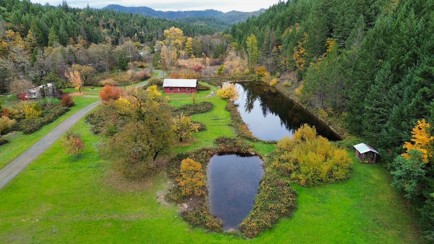 Welcome to Harboldt Ranch. This 175+ acres is ideal as a family retreat, with 4 parcels, (dividable per the County)! The homesites blend seamlessly with forest, pasture, ponds & creek bottom filled with wildlife. Within 17 minutes of amenities, the ranch can be used as a retreat or location to build your multi-generational homestead. Stunning year-round Slate Creek runs the length of the property on each of the 4 parcels, offering recreation, farming & marketable timber. With stocked pond, fruit trees, pasture & solar powered pumping station for irrigation, the property beckons the self-sufficiency minded buyer! The updated farmhouse features newer roof, rain gutters & windows, 4 bedrooms, 2 baths, mudroom, remodeled kitchen & baths, deck & attached garage, while the 3 mobile homes act as placeholders for future new home placement. The careful stewardship of this ranch spans 3 decades offering healthy forests, abundant wildlife, a peaceful setting & income potential!
