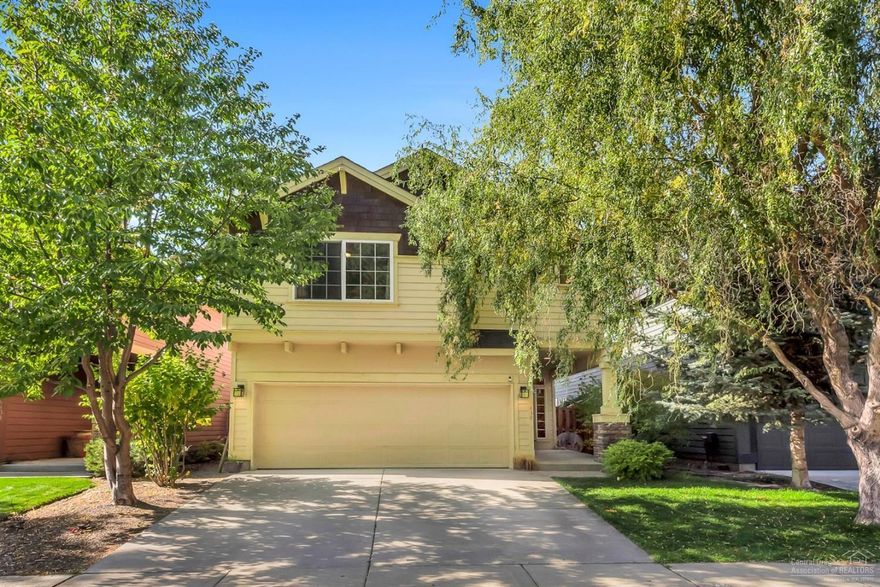 Highly coveted River Canyon Estates home sitting directly across from the Hollygrape Park. Essentially a huge yard for the kiddos or furry ones to run and play that you don't spend your weekends tending! Other small pocket parks throughout the neighborhood, a community pool, clubhouse, gym, tennis court and only a few blocks to the beautiful Deschutes river trails. Upstairs separation between the master and the other 2 bedrooms that share a Jack and Jill bath. Laundry area and loft space complete the upstairs. A comfortable open great room with gas fireplace flanked by custom built-ins and a kitchen situated in the heart of it all. A half bath rounds out the downstairs. One of Bend's best kept secrets! This is such a friendly neighborhood with 2 grade schools on either side and easy access to just about anywhere you need to go!