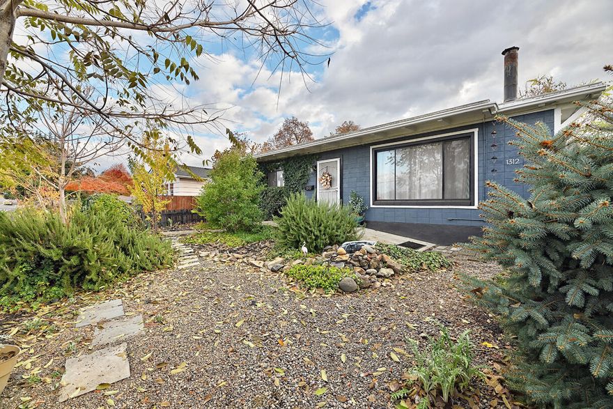 Back on market at no fault of the property. Perfect starter home or ideal investment property! This cozy 2 bed, 1 bath gem is ready for you to move in but also offers a fantastic canvas to add your personal touches. Step inside and enjoy an open floor plan with a spacious living room featuring a warn fireplace and a versatile bonus room. Outside, your personal retreat awaits-complete with a hot tub, gazebo, and fire pit for ultimate relaxation or entertaining. Plus, there's ample off-street parking! Conveniently located near parks, schools, shops, theaters, and restaurants-this spot puts all the essentials at your fingertips. Whether you're a first-time buyer or savvy investor, this charming home is priced just right to kickstart your homeownership journey. Don't miss out on this opportunity!