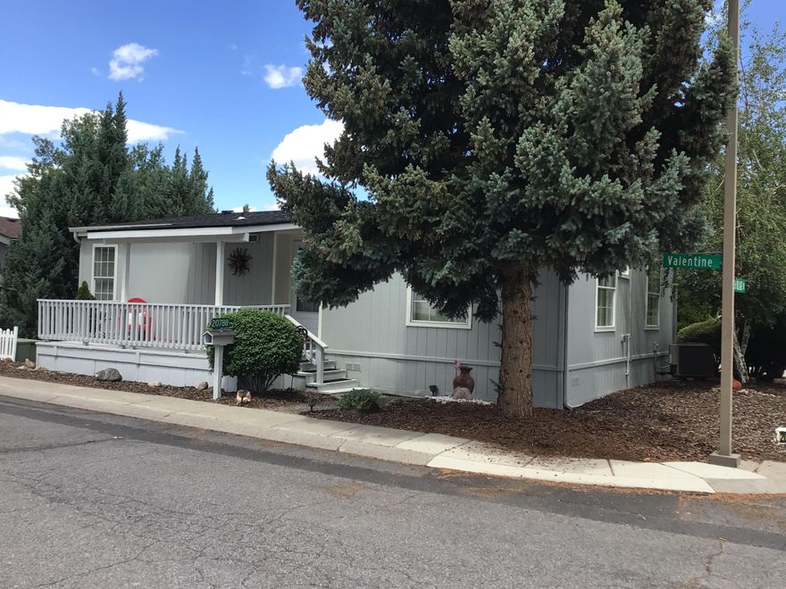 MOVE in READY CASCADE VILLAGE 55 Plus community. This 2 Bed/2 Bath, 1080 sqft home is located on a Corner lot with Large garage and a storage shed. This well cared for home is ready for a New Owner.  Private back deck patio area. Land lease is $715.00 per month, which includes Clubhouse, Pool, Street snow removal, and common area. Water is private AVION water billed every 4 months. Park approval needed by Management 541-388-0000 Call LA for all showings. 503-730-9755, No Rentals allowed in the park.