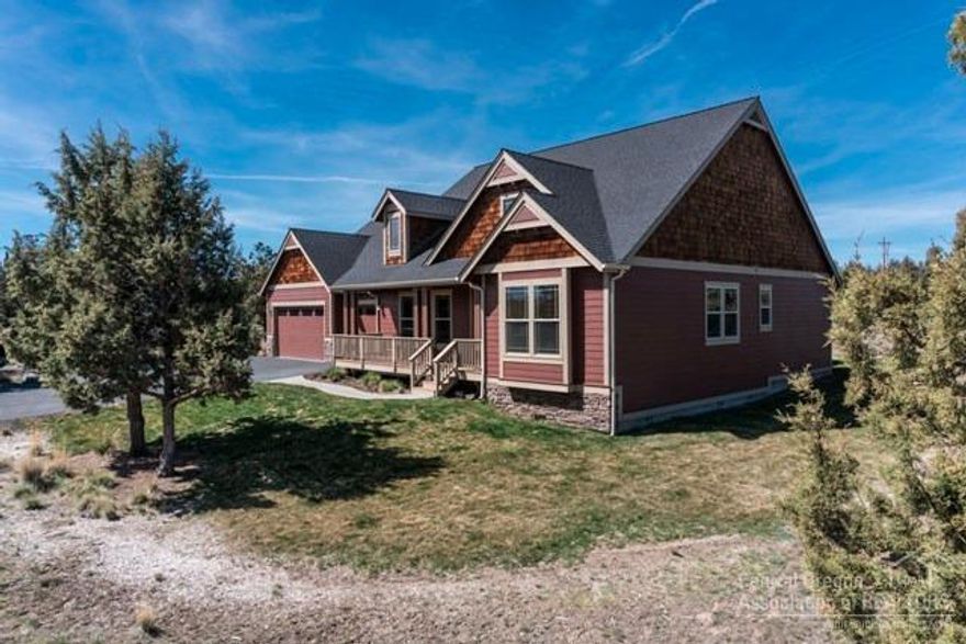 Beautiful home in gated community situated on 5.5 acres. Spacious 2778sf, 3bd, plus den/office and hobby room. Quality shines through with slate entrance, maple wood floors, maple cabinets, tile in bathrooms, solid wood doors, gas fireplace in living room, covered deck in front, triple car garage. Storage shed, fenced, raised bed garden area.